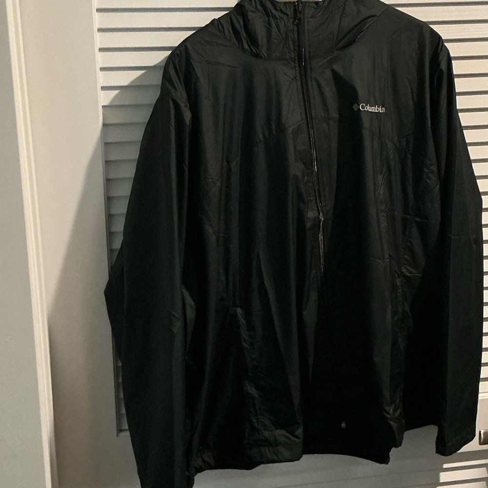 NWT Columbia Zumba Stack Jacket with Hoodie, pull string waist and two pockets.